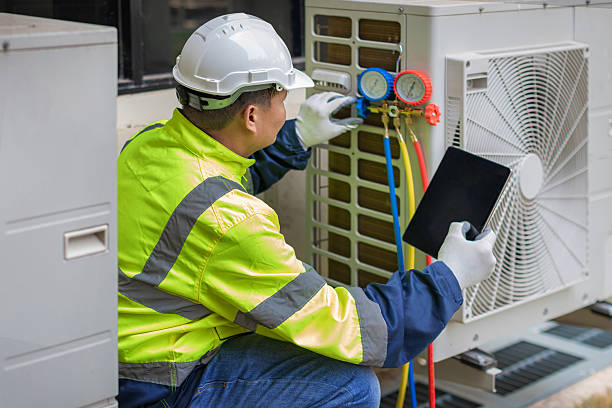 Professional Ac Installation technician working in Morrisonville, IL